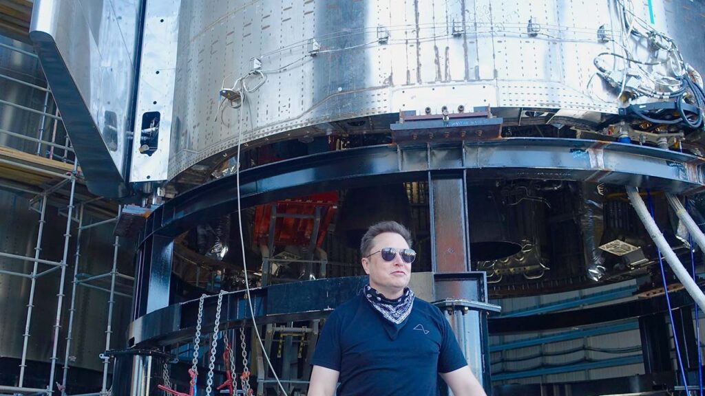 Elon Musk posing in front of Starship Prototype #SN9.