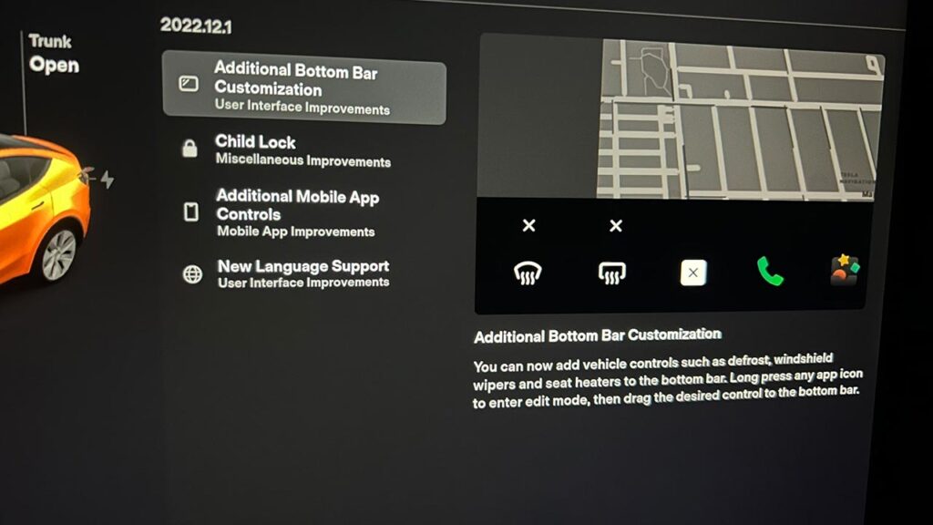Screenshot of the Tesla software update 2022.12.1 release notes for the Additional Bottom Bar Customization feature.