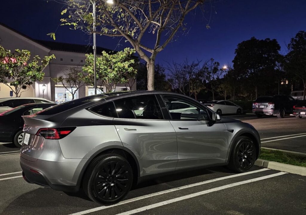 A Tesla Model Y in Quicksilver color spotted in a parking lot in California.
