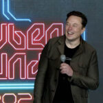 Elon Musk laughs at Tesla's 2024 Annual Shareholder Meeting as he gets the approval for his $56 billion pay package.