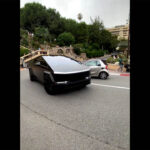 Matte Black Cybertruck takes a smooth turn at the Monaco Hairpin Curve using its 4-wheel steering.