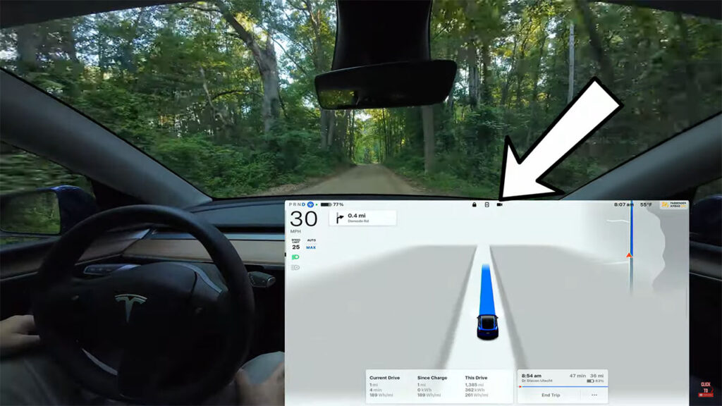 The little camcorder icon in the middle of the center touchscreen as the Tesla vehicle runs on Autopilot (FSD) shows this driver is from the original (old) group of beta testers.