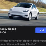 Screenshot of the Tesla app showing the option to buy 50 miles of extra range for $1,600.