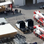 Two Tesla Semi-trucks visible in a drone footage capture outside the Giga Berlin factory.