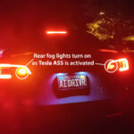 Rear fog lights on a HW4 Tesla Model Y turn on as the Actually Smart Summon (ASS) feature is activated.