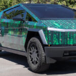 Front side view of Tesla Cybertruck wrapped in Matrix code.