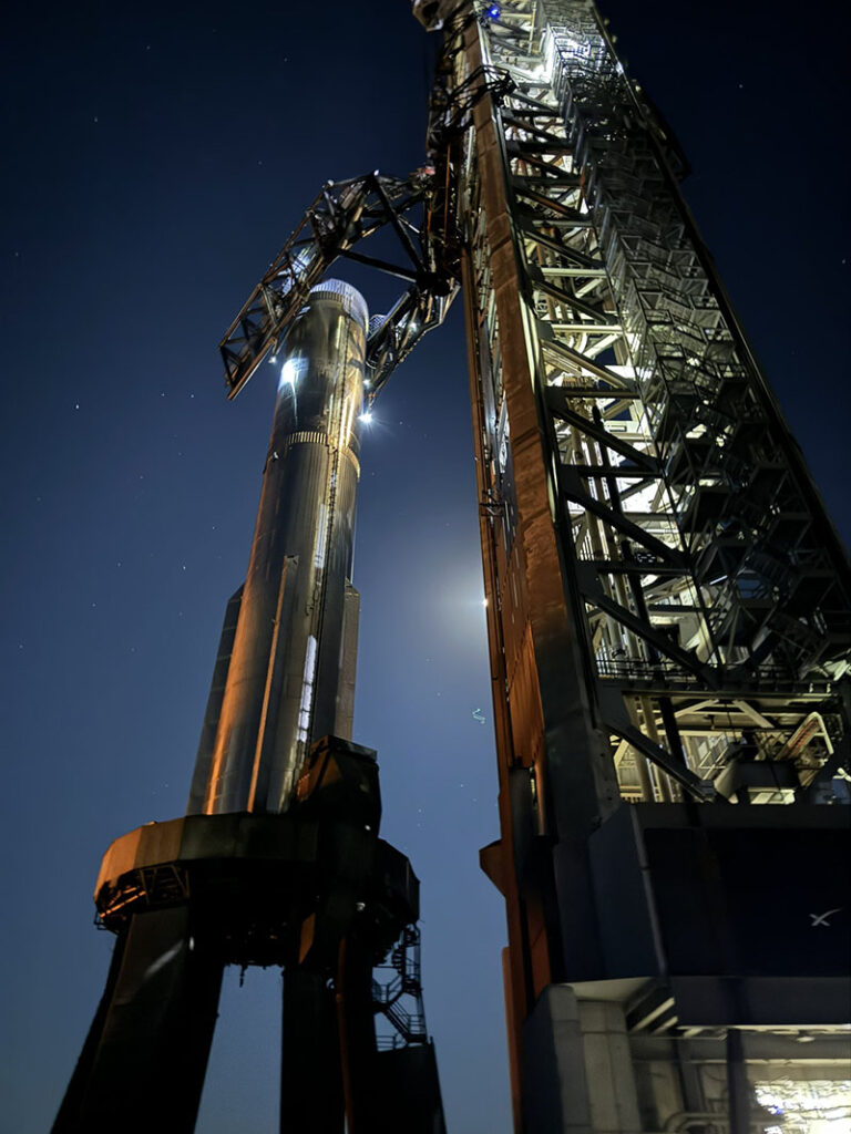 Starship Flight 5 Super Heavy booster rests on the OLM at Starbase several hours after the landing catch event.