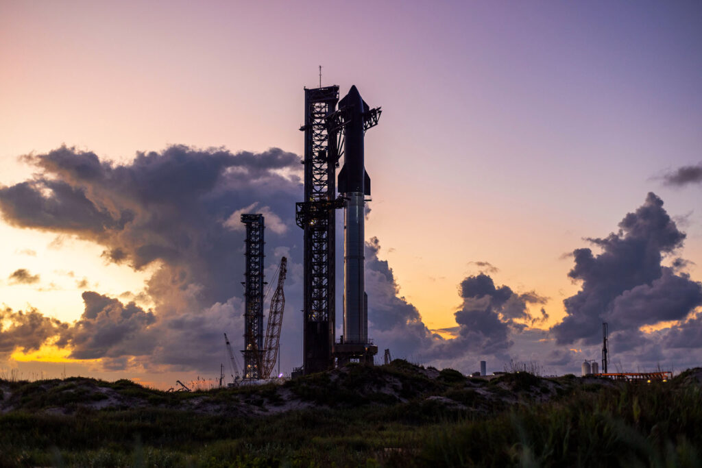 Fully integrated Flight 5 Starship mounted on the orbital launch mount (OLM) at the SpaceX Starbase launch site in Boca Chica, Texas.