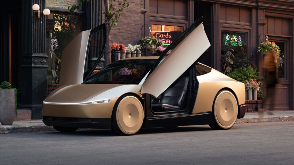 Tesla Robotaxi vehicle parked in a modern urban setting with its butterfly doors open.