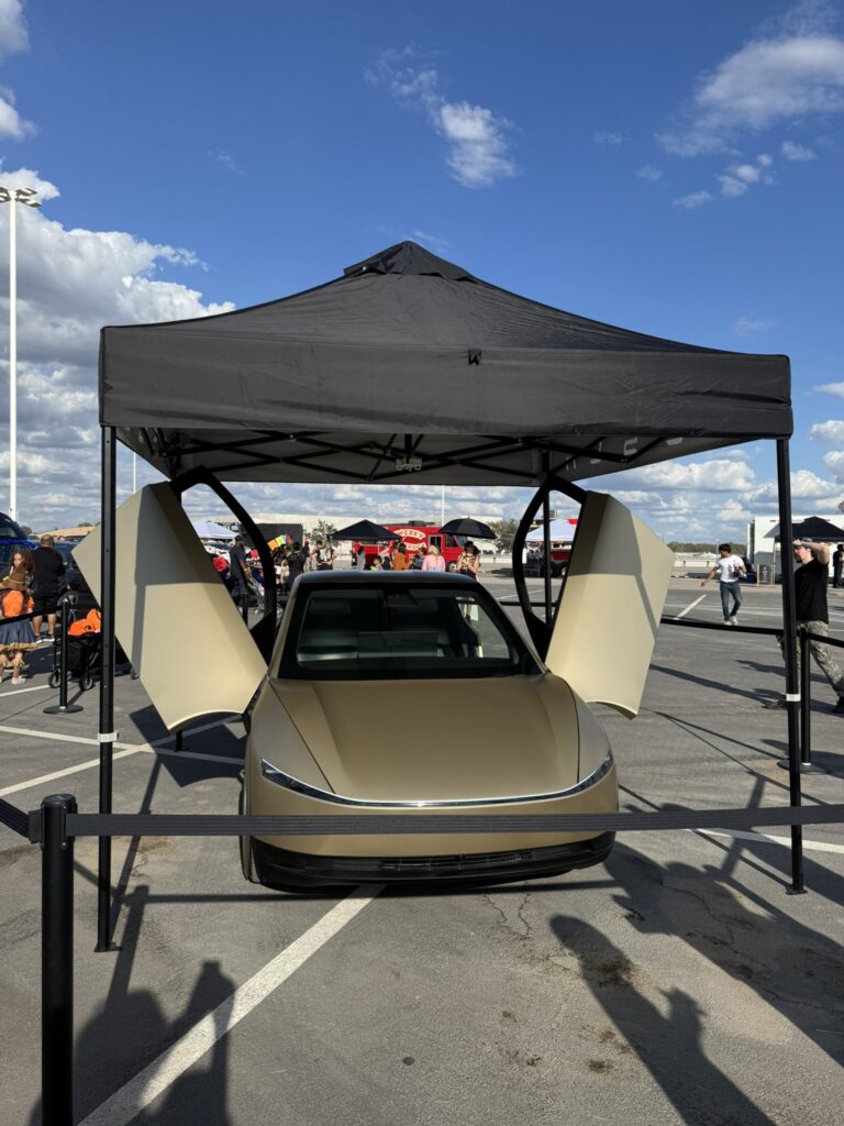 Front fascia of the Tesla Robotaxi prototype on display at Giga Texas.