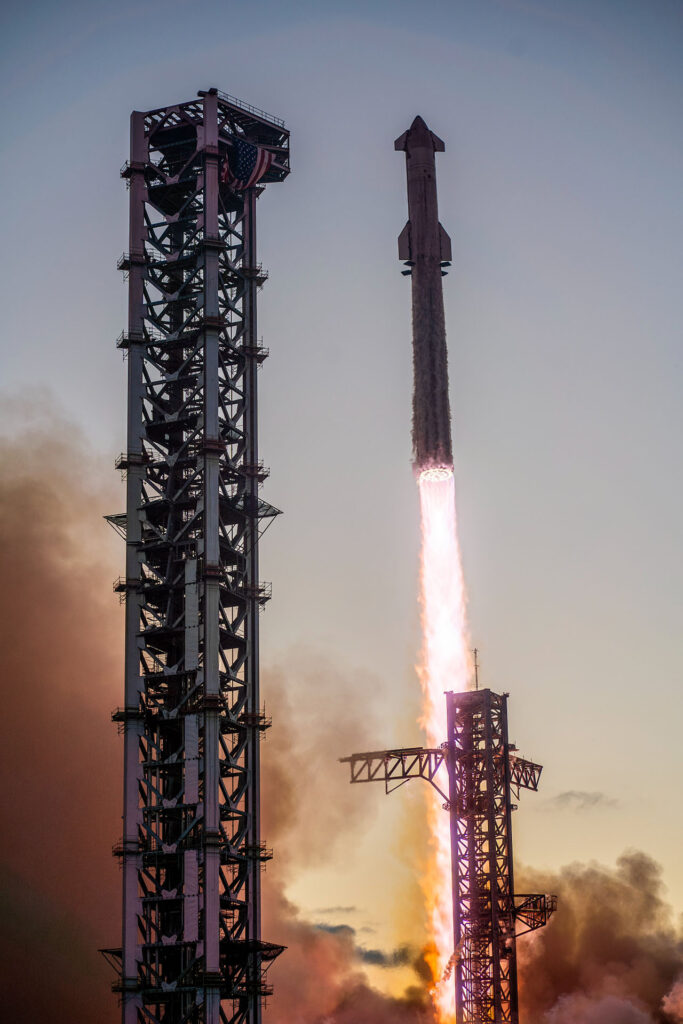 The moment when Starship Flight 5 lifted-off the Starbase Orbital Launch Mount (OLM). 2nd launch tower (front), Mechazilla launch tower (rear).