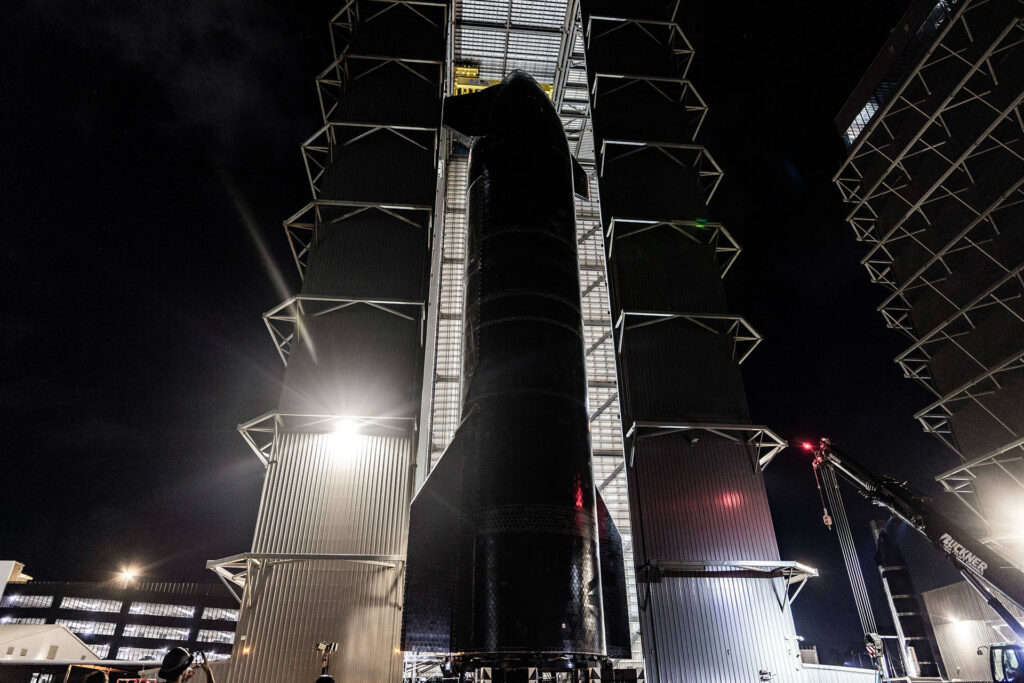 Flight 6 Starship leaves the High Bay at SpaceX's Starbase launch site to be mounted on the OLM. 